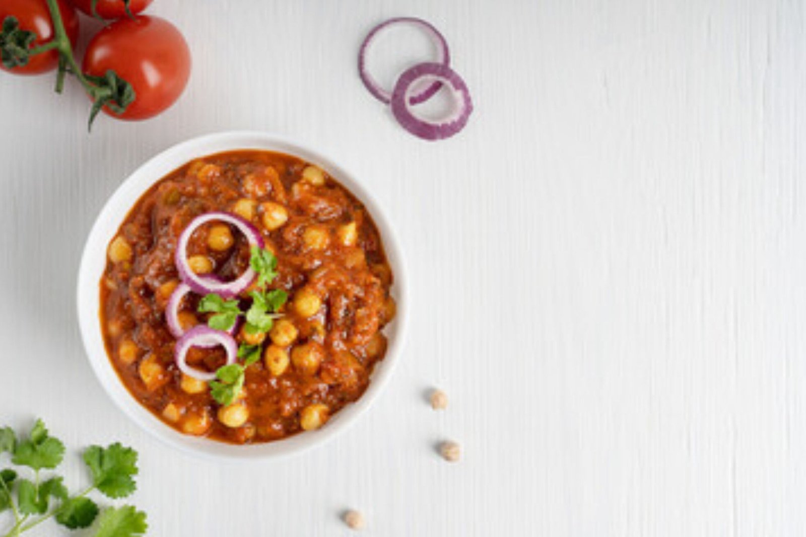 Close-up View of Chai Patti Wale Chole in a White bowl.