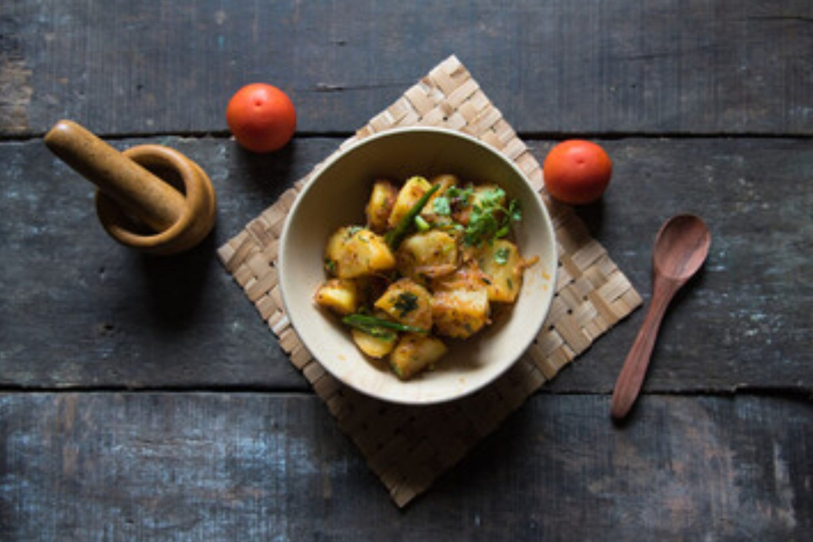 front view of jeera aloo in a bowl