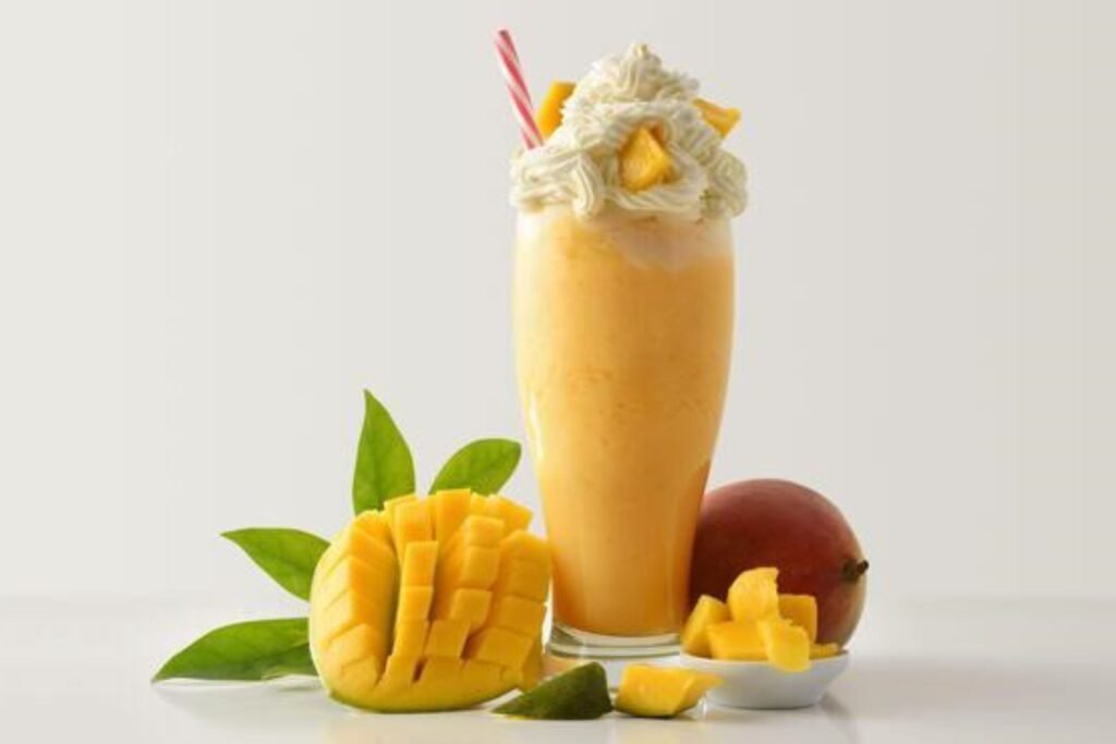 Close-up View of mango milkshake in a glass