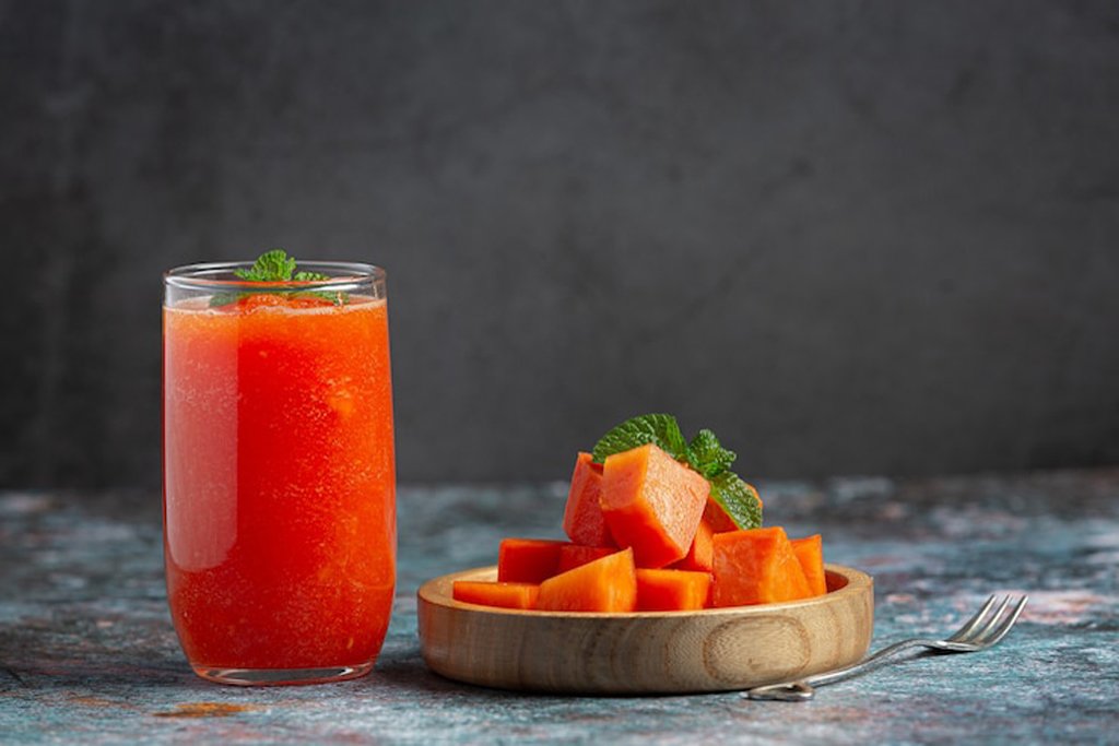 Front view of papaya juice in a glass