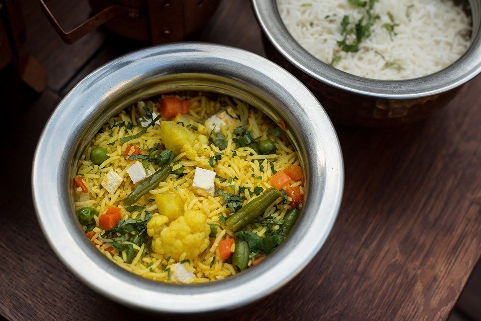 Close-up view of vegetable pulao in a bowl.